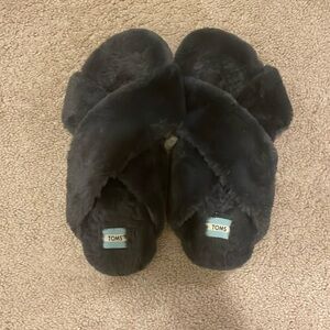 Tom’s slippers